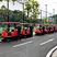 Fleet of red BT-BAW1800 industrial ride on sweepers outdoors